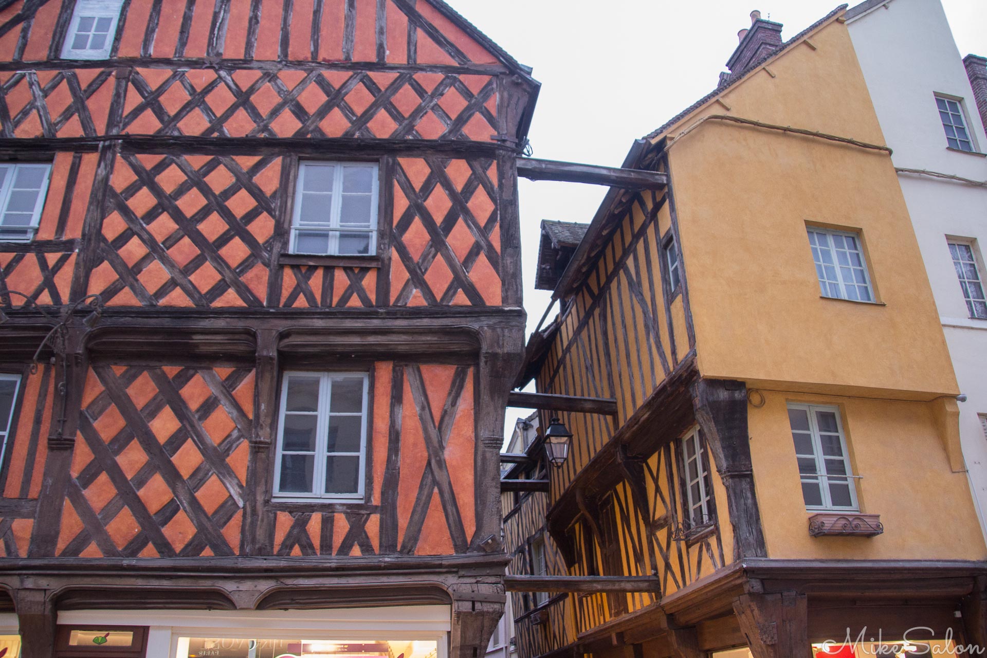 Shambles of Dreux : Wooden houses in Dreux dating back to the 15th Century lean precariously towards each other across a narrow lane. (IMG_2549.jpg)<br>Camera: Canon EOS 60D