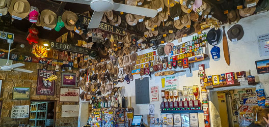 Like many outback pubs, the bar area of the Birdsville Hotel is replete with country memorabilia. [0635]