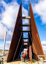 Visitors examining names at the Broken Hill Line of Load Miners` Memorial. [2906]