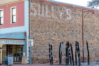 Story Poles artwork on a vacant block in Argent Street, Broken Hill. [3052]