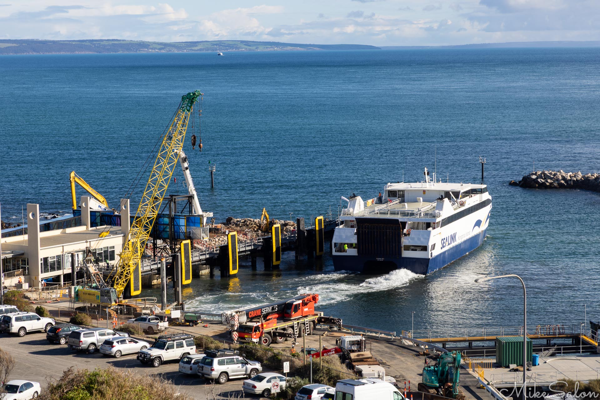 Amid a large port reconstruction project, the SeaLink ferry departs Cape Jervis for Kangaroo Island. [3286]