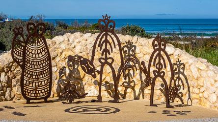 These rusted‑steel figures make a dramatic sculpture at Goolwa Beach. They represent Ngarrindjeri ancestral spirits and creation stories, designed in collaboration with local Indigenous artists. The forms echo traditional iconography — stylised human and animal shapes, concentric circles, and hand motifs — symbolising connection to land, water, and community. [2011]
