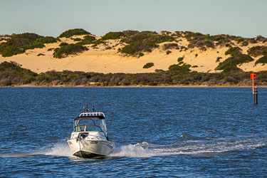 A fishing boat roars past us near the Younghusband Peninsula's sandhills. [1793]