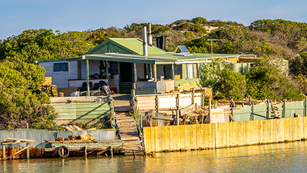Not sure of the legal status of these shacks on the Younghusband Peninsula past the Murray Mouth, but Jesse, our captain, was very solicitous and slowed down to minimise wash. [1839]
