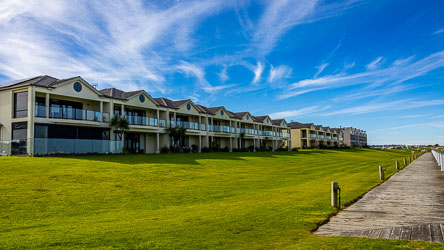 Terraced residences on the waterfront in a marina on Hindmarsh Island. [2054]