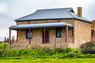 Built from local stone and iron, the 19thC Bretag family homestead stands as a reminder of Monarto’s early settlers — simple, sturdy, and shaped by the landscape it overlooks. The family were early pastoralists who farmed and grazed in the region. [2925]