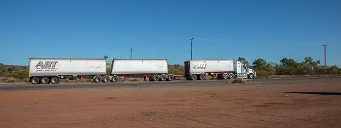The view from the Abacus Motel in Mt Isa, red soil and road trains. [1123]