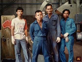 Four Indonesian Crew Members in front of heavy industrial equipment.
